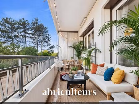 t3 traversant lumineux avec grande terrasse  vue exceptionnelle sur parc  au cœur de la cr