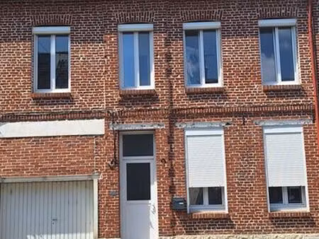 maison avec garage et cour intérieure