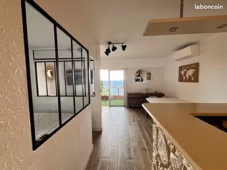 grand studio avec coin nuit & vue mer • terrasse sans vis-à-vis • climatisation  parking e