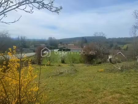 terrain 1 059 m² murs et gelignieux