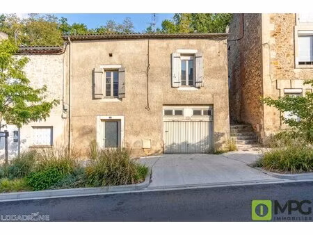 a fumel  ensemble immobilier avec deux appartements et un garage