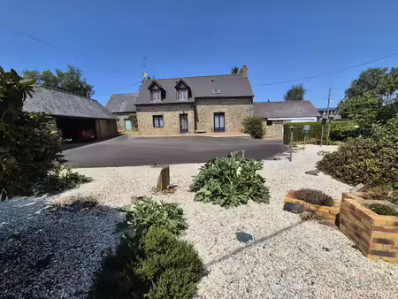 ref 120272- en campagne  à 6 km de gorron  belle maison en pierres de plain pied avec gren