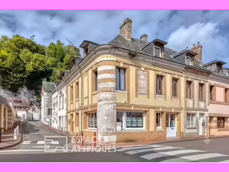 immeuble loué composé d'un local commercial et appartement