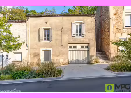 a fumel  ensemble immobilier avec deux appartements et un ga