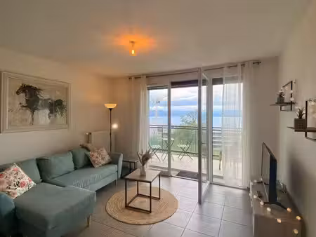 t2 meublé avec vue lac  terrasse et parking – évian-les-bains