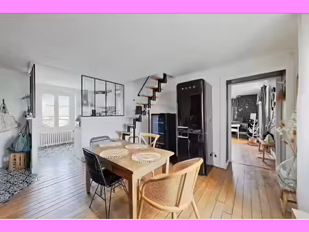 appartement duplex à lagny-sur-marne : volumes sous charpente face à l'eau