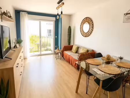 appartement de type 3 avec balcon et place de parking en sou