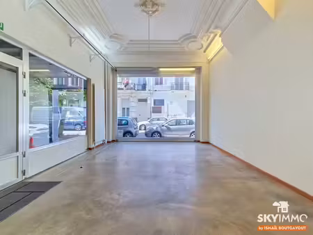 rdc commercial avec dépôt et atelier de 335 m²