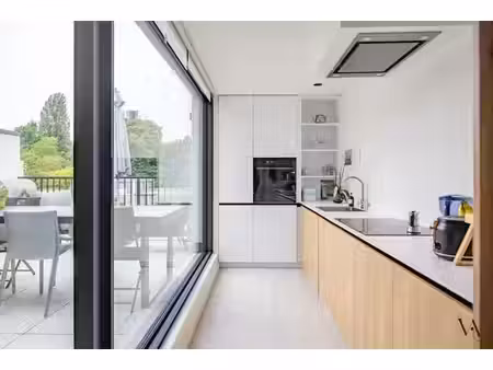 exclusief triplexappartement met 4 slaapkamers in gerenov...