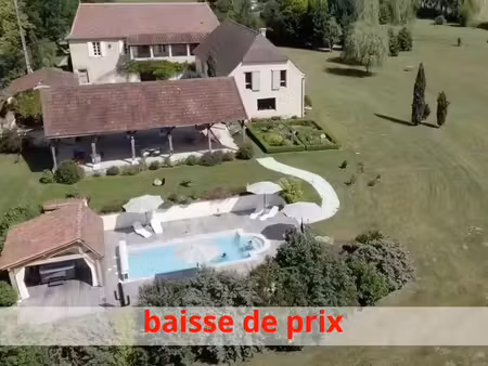 magnifique ensemble comprenant une maison principale et hébergements touristiques sur un t