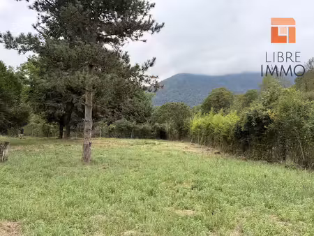 à vendre  izeste  terrain plat constructible 1120 m²