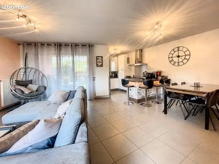 charmant appartement de 75 m² avec jardin privatif et garage à saint-jean-bonnefonds