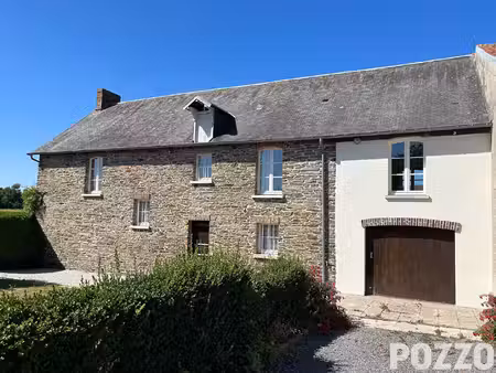 grande maison en pierres située à saint pierre de semilly