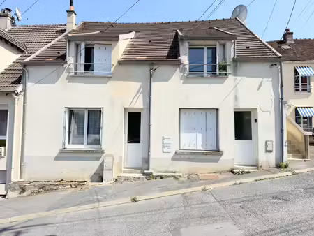 immeuble comprenant trois logements.
