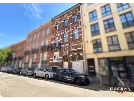immeuble comprenant 4 appartements à proximité de la gare