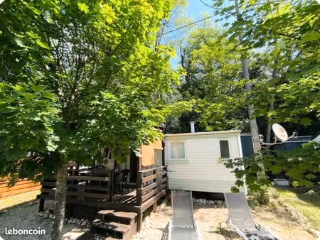 mobil-home clé en main avec 2 parkings dans camping avec piscine et rivière
