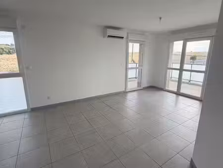 très bel appartement t3 + 2 places parking