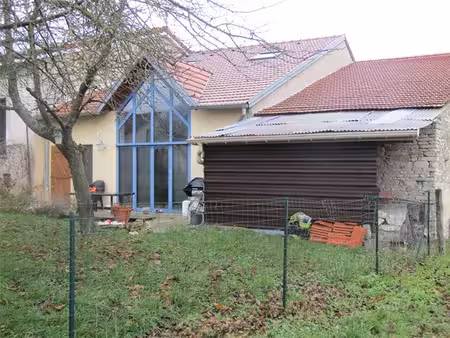 maison mitoyenne atypique avec jardin et garage