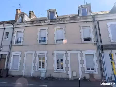 ensemble immobilier complet – immeuble + maison + 15 garages 100% loué
