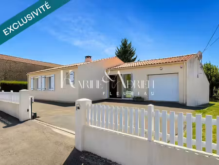 maison de plain-pied 2 chambres  véranda  garage  dépendance et jardin clos