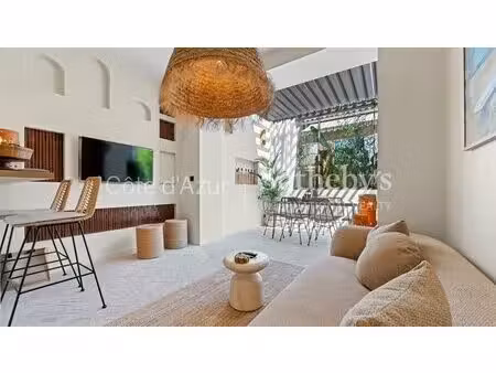 appartement rénové de 68 m² avec terrasse et garage au coeur de s