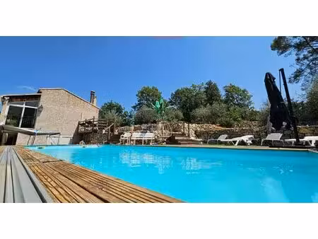 maison unifamilialle ou deux logements  terrain 1900 m2   piscine