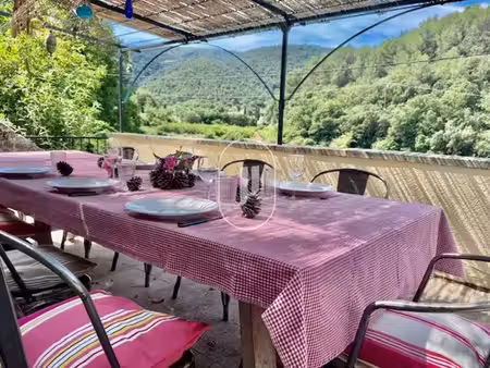 authentique maison en pierre avec piscine et vue sur le luberon à vendre à ménerbes