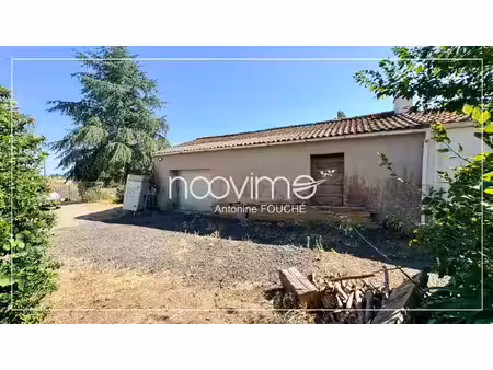 terrain constructible de 410 m2 avec bâtiment frossay