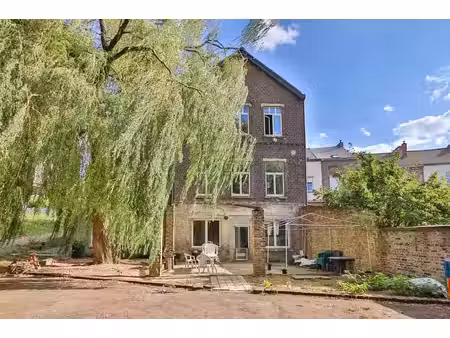 immeuble de rapport —7 appartements + garage + container20'