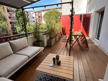 t2 traversant avec terrasse de 21m² – calme & standing – canal du midi
