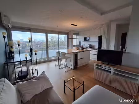 t2 meublé 46 m² – compans-caffarelli – parking – clim – balcon – cave