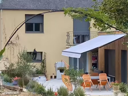 maison familiale dans un parc arboré