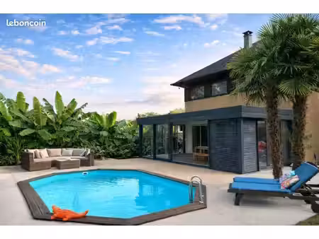 maison d'architecte unique avec piscine et étang privatif – cadre exceptionnel