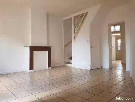 a vendre maison de ville avec jardin