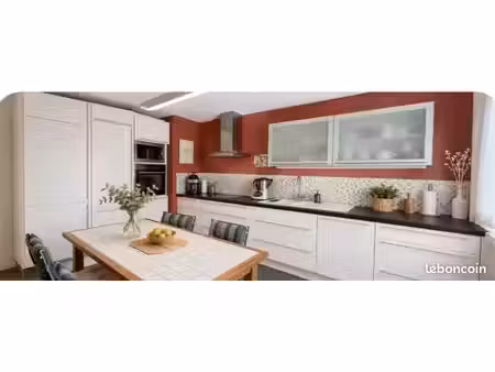 maison familiale 115 m² – 4 chambres – terrain 1 129 m² – 2 garages – proche centre-ville 