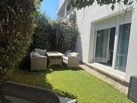 t1 bis 33 m² - jardin privatif - parking - résidence récente