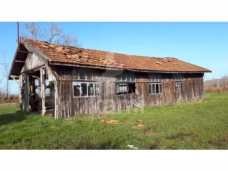 terrain naturel de 2 650 m2 avec grange à rénover beau pot