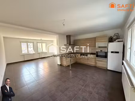 superbe appartement de 3 pièces au rdc  disposant de 2 places de stationnement privées et 