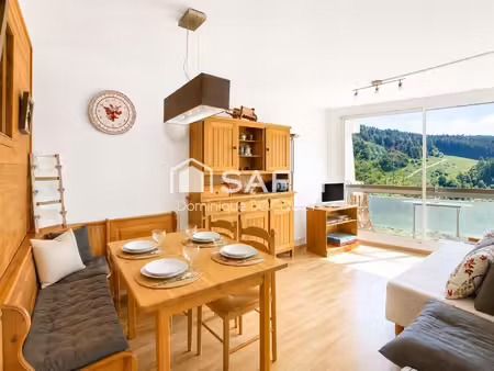 t2 + cabine  au pied des pistes et des commerces  exposé sud-ouest