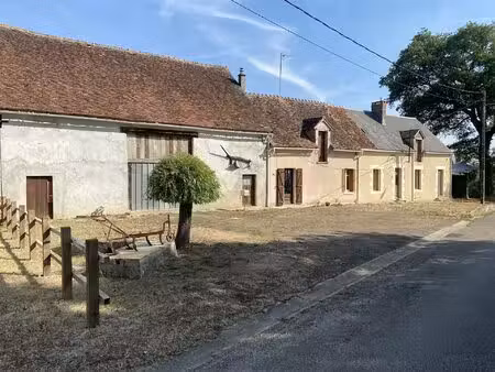 deux maisons et une grande grange dans un hameau calme