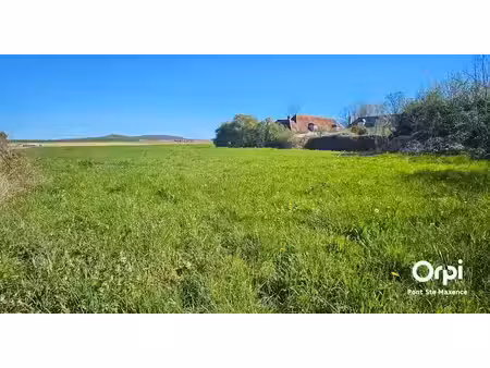 vente terrain 2415 m² à bazicourt (60700)  150 000 €