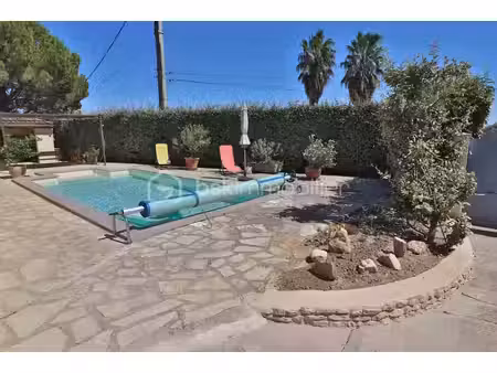 maison plain-pied de 106m² sur 780m² de terrain avec 3 chambres  garage et piscine
