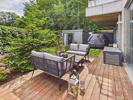 appart rdc de standing 2/3ch avec terrasse & parking -peb d