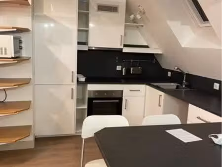 appartement f2/f3 avec mezzanine totalement meublé avec place de parking