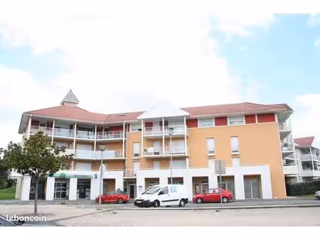 vente t2 bis 52 m2 avec 2 places de parking aérien sécurisé