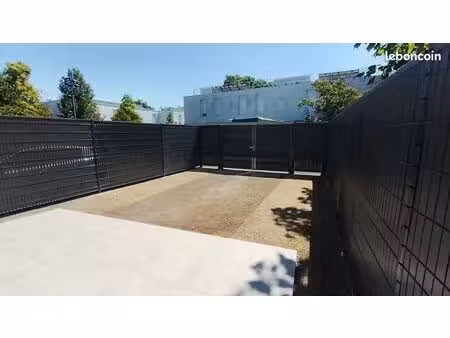 t2 de 57 m² avec jardin privatif de 50 m² - parking - rénové - faibles charges