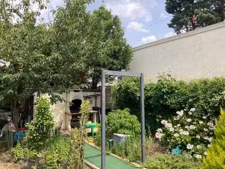 appartement t3 donnant sur jardin avec véranda et terrasse
