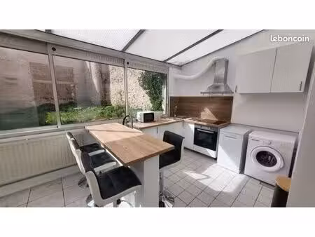 appartement rdc en hyper centre avec jardinet