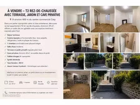 t2 rdc plein centre ville avec terrasse  jardin et cave privative à environ 400 m du centr