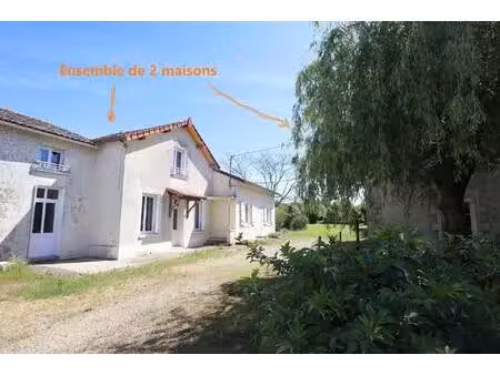 2 maisons habitables + grange sur terrain de 1200m2